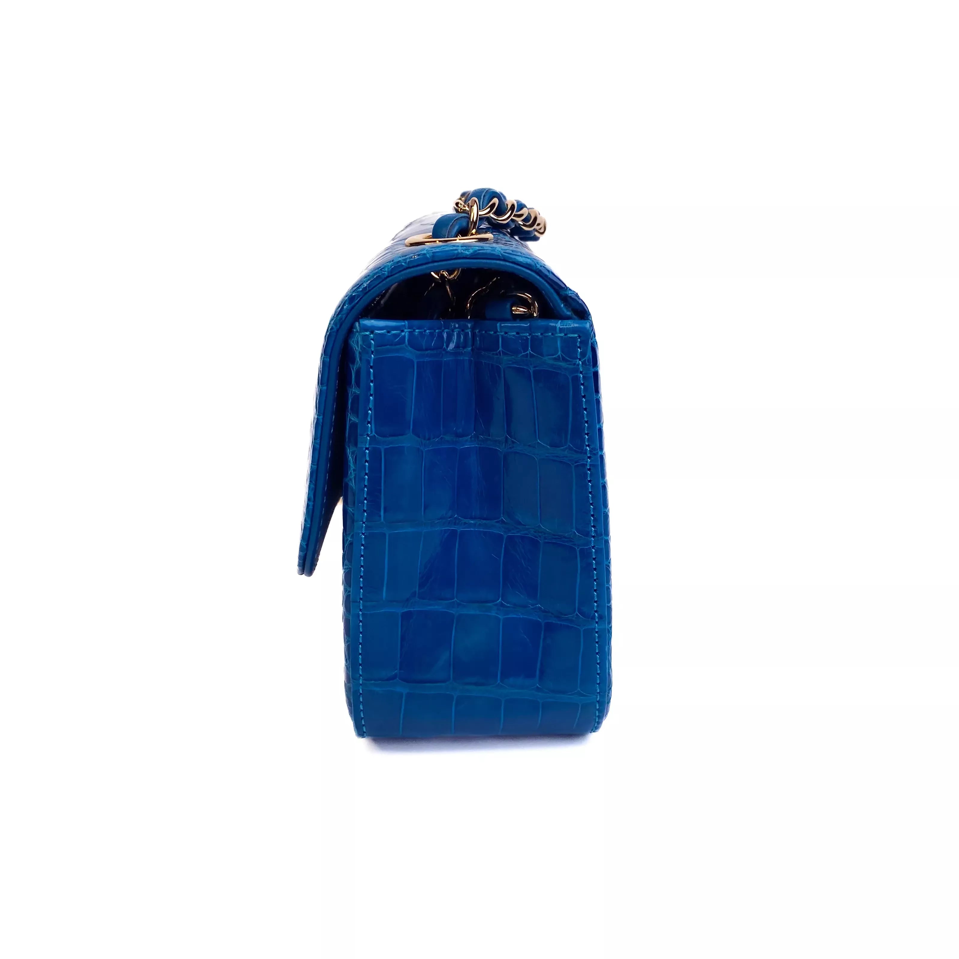 CHANEL Lagoon Blue Shiny Alligator Classic Mini Flap Bag with Gold Hardware Left Side
